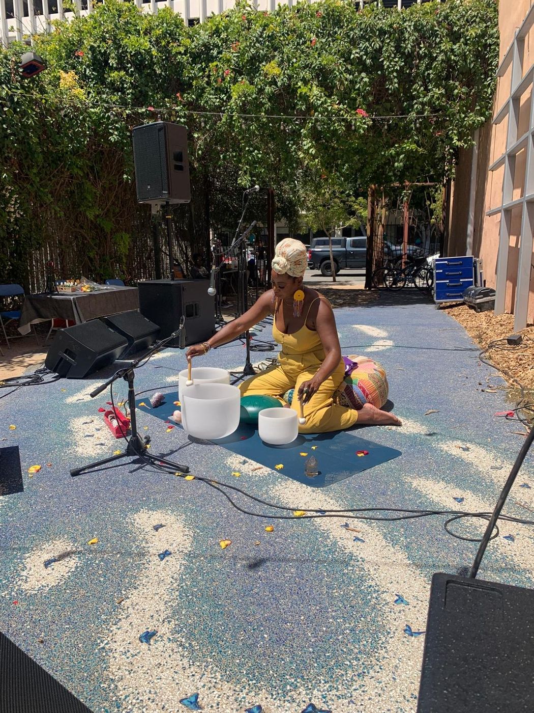A sound healing session set up outdoors