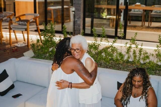 A warm embrace on a white terrace